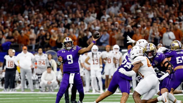 Jan 1, 2024; New Orleans, LA, USA; Washington Huskies quarterback Michael Penix Jr. (9) passes the ball against the Texas Longhorns during the second half of the 2024 Sugar Bowl college football playoff semifinal game at Caesars Superdome.